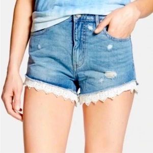 Free People distressed denim shorts with lace